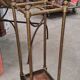 Brass and copper umbrella stands, early 20th century.