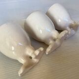 Set of cracked egg cups with feet