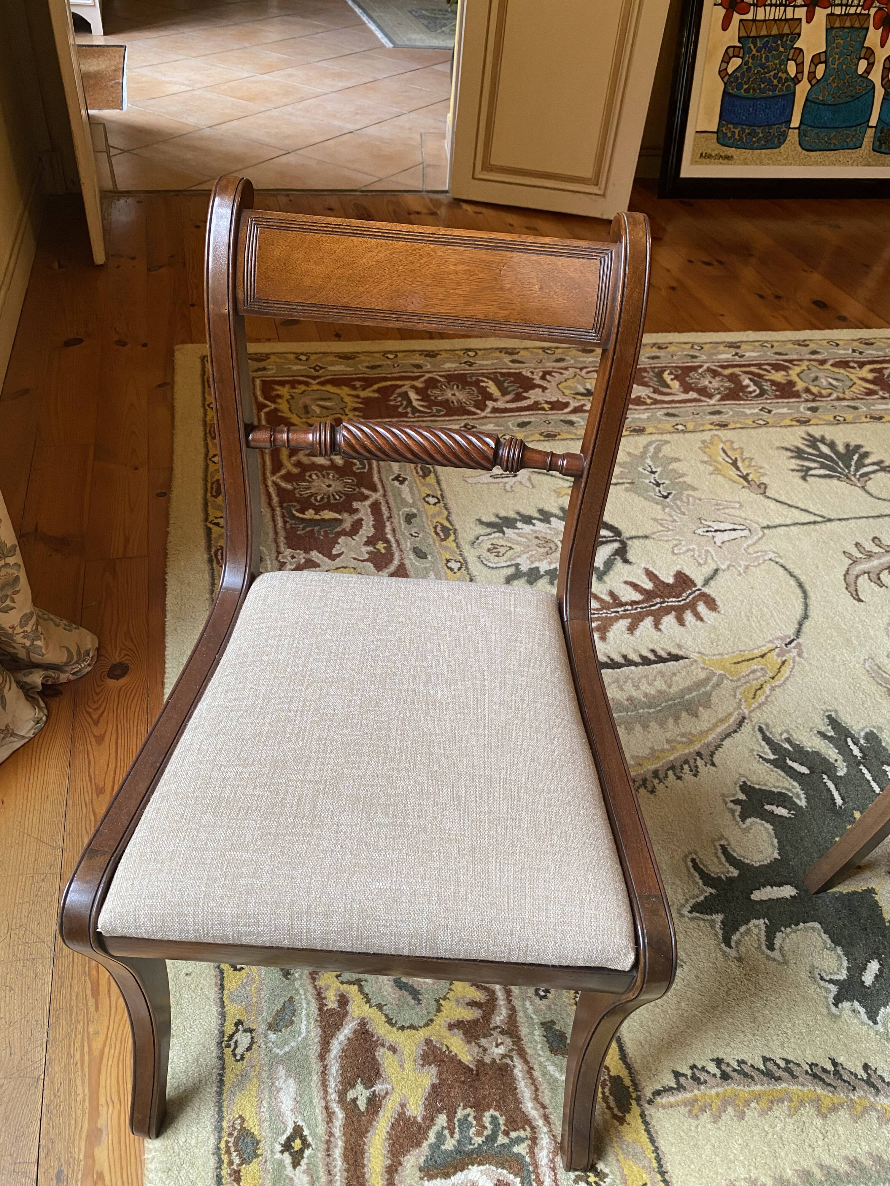 Set of 10 antique Trafalgar chairs in mahogany with twisted backrest.