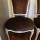 A pair of Louis XV style armchairs in wood and velvet fabrics