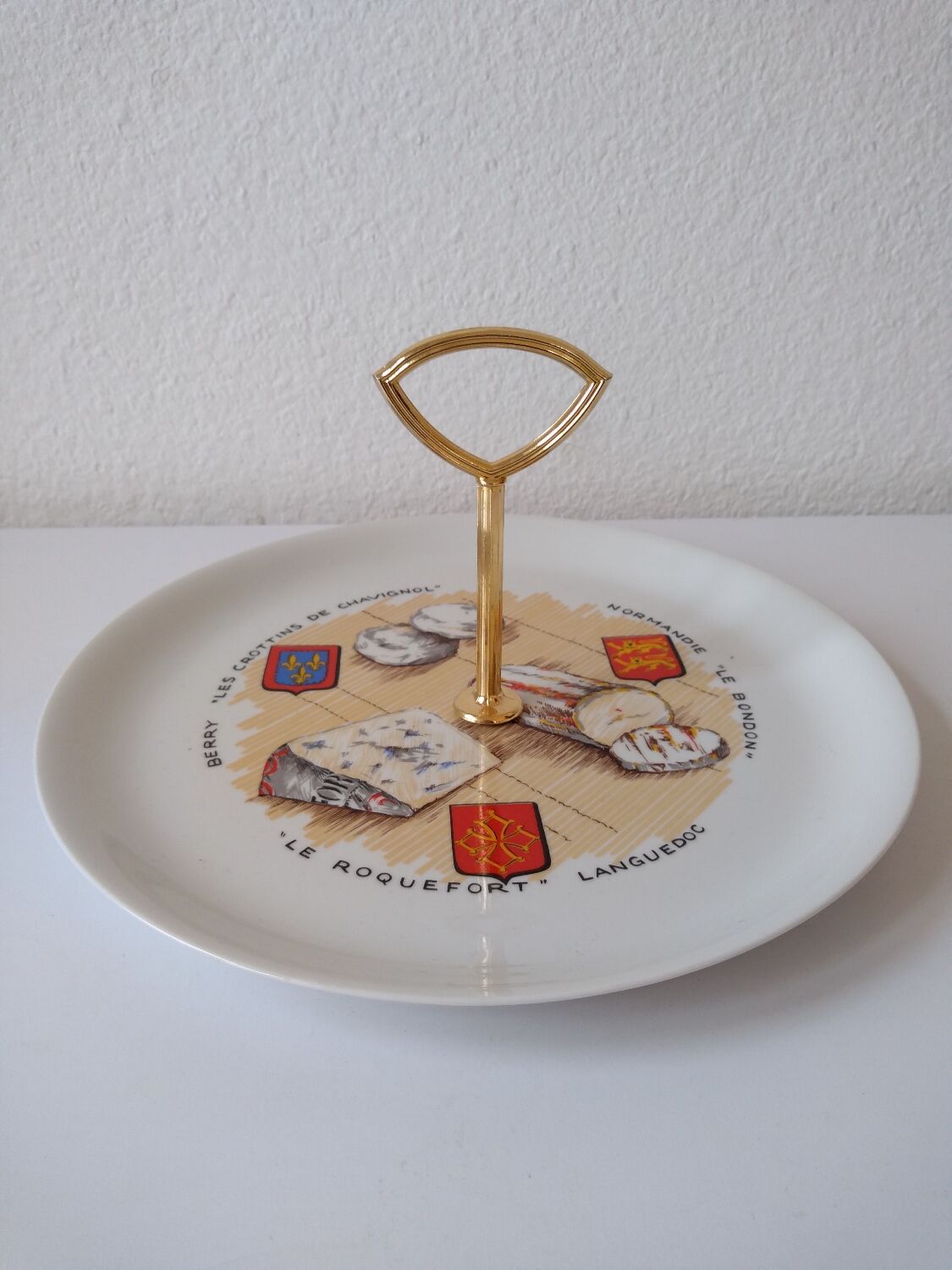 Limoges porcelain cheese service with drawing of regional cheeses and coats of arms 1 tray and 6 plates