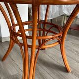 Table à manger verre fumé et rotin