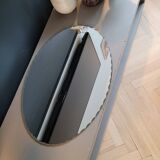 Antique oval mirror with chiseled edges