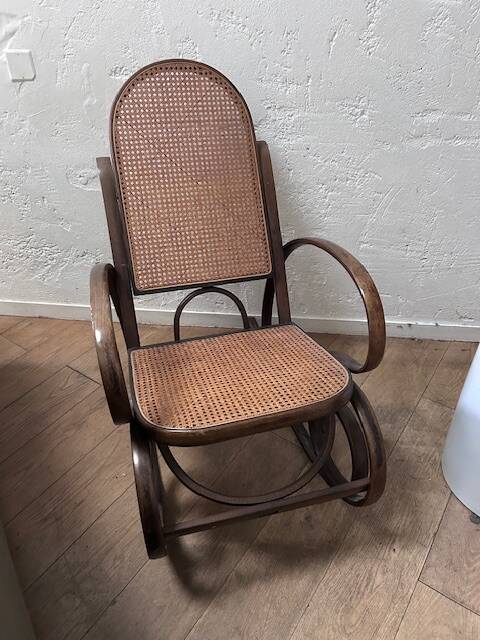 Curved wooden rocking chair