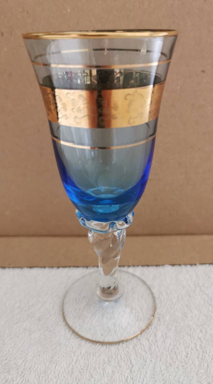 7 vintage crystal glasses