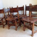 Set of 8 walnut and leather chairs from the 1950s