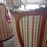 Pair of carved bergere armchairs