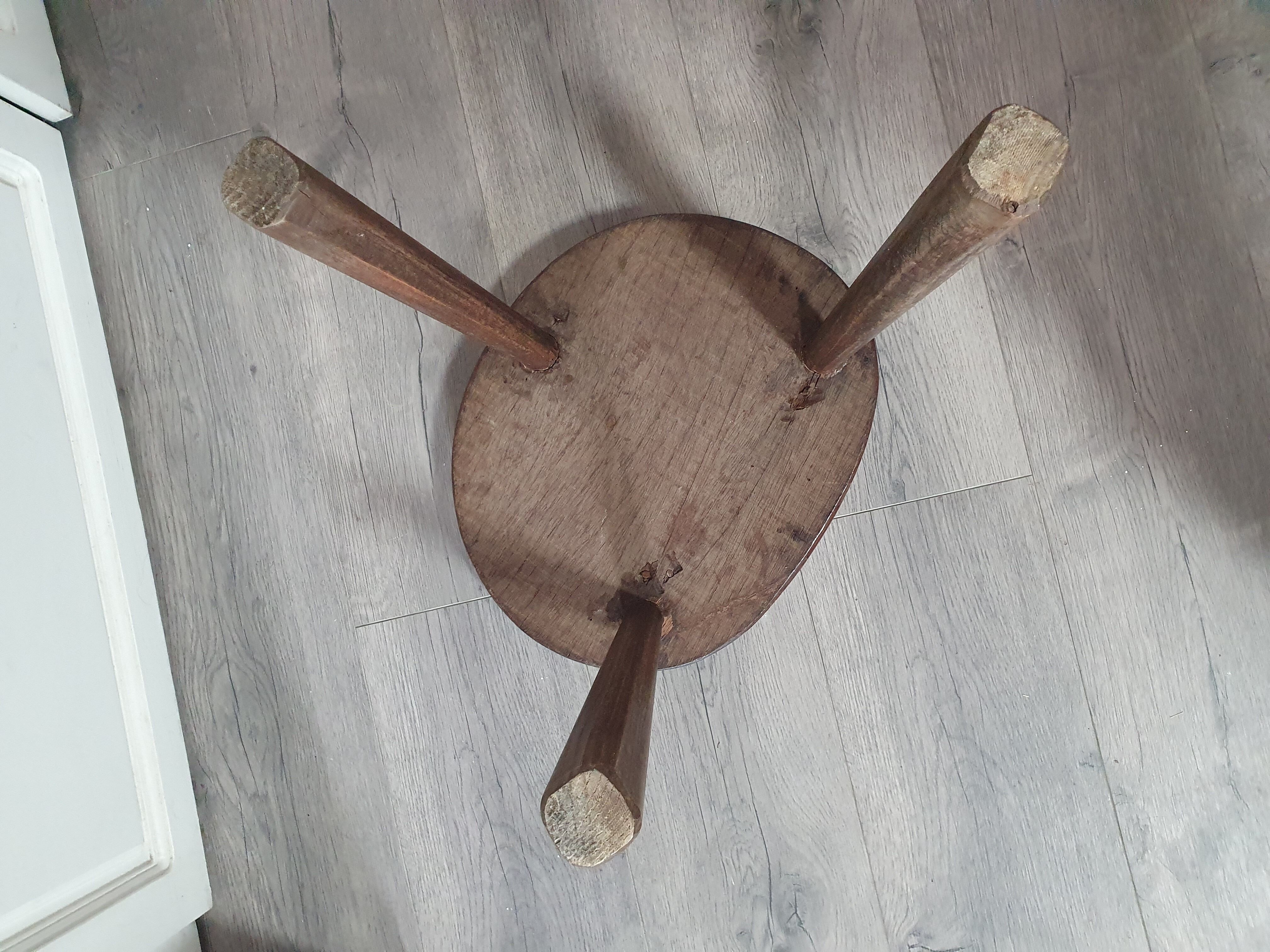 Vintage old wooden stool tripod