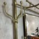 Large brass coat hook, circa 1900