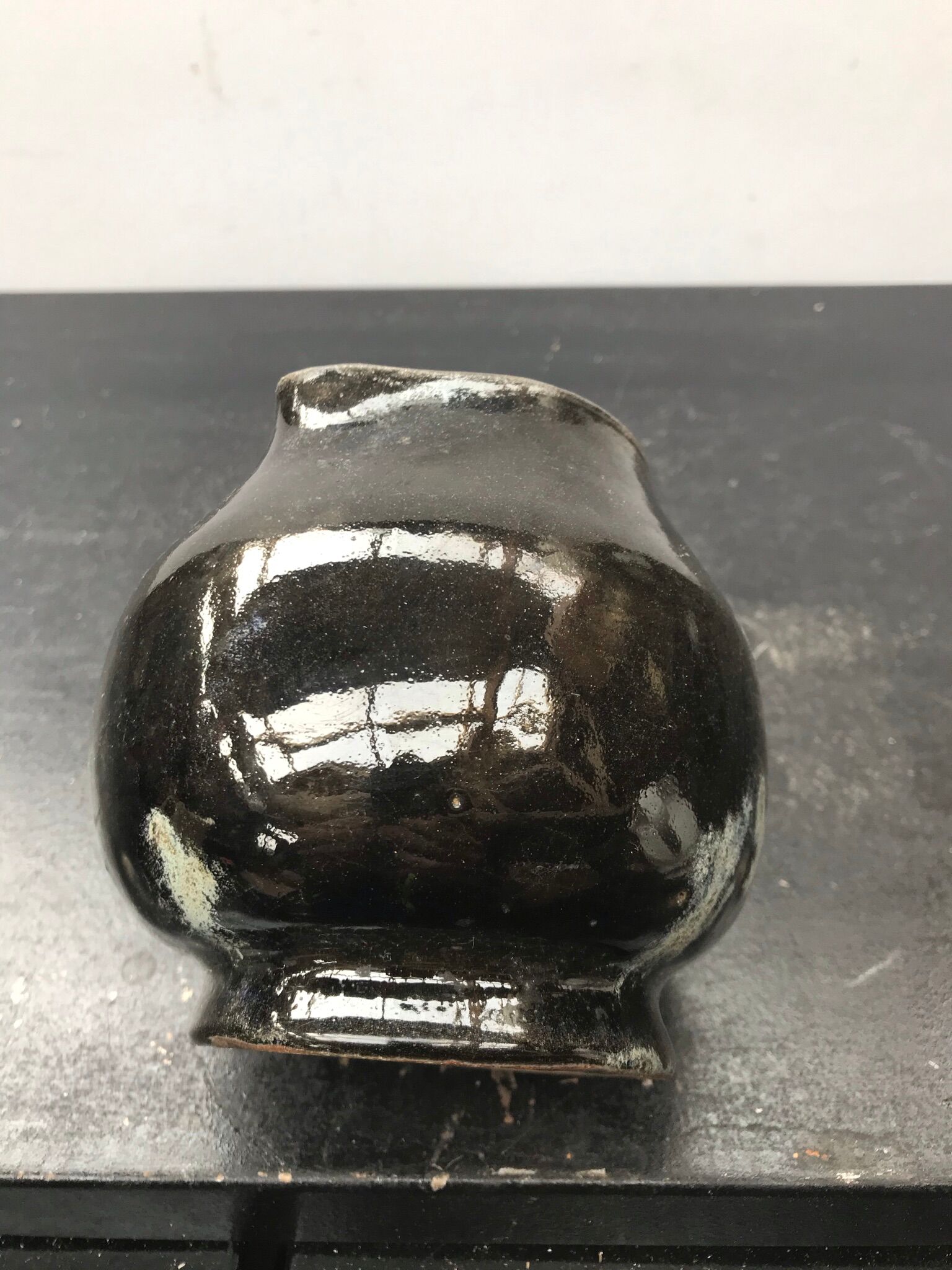 Former black ceramics pitcher 70
