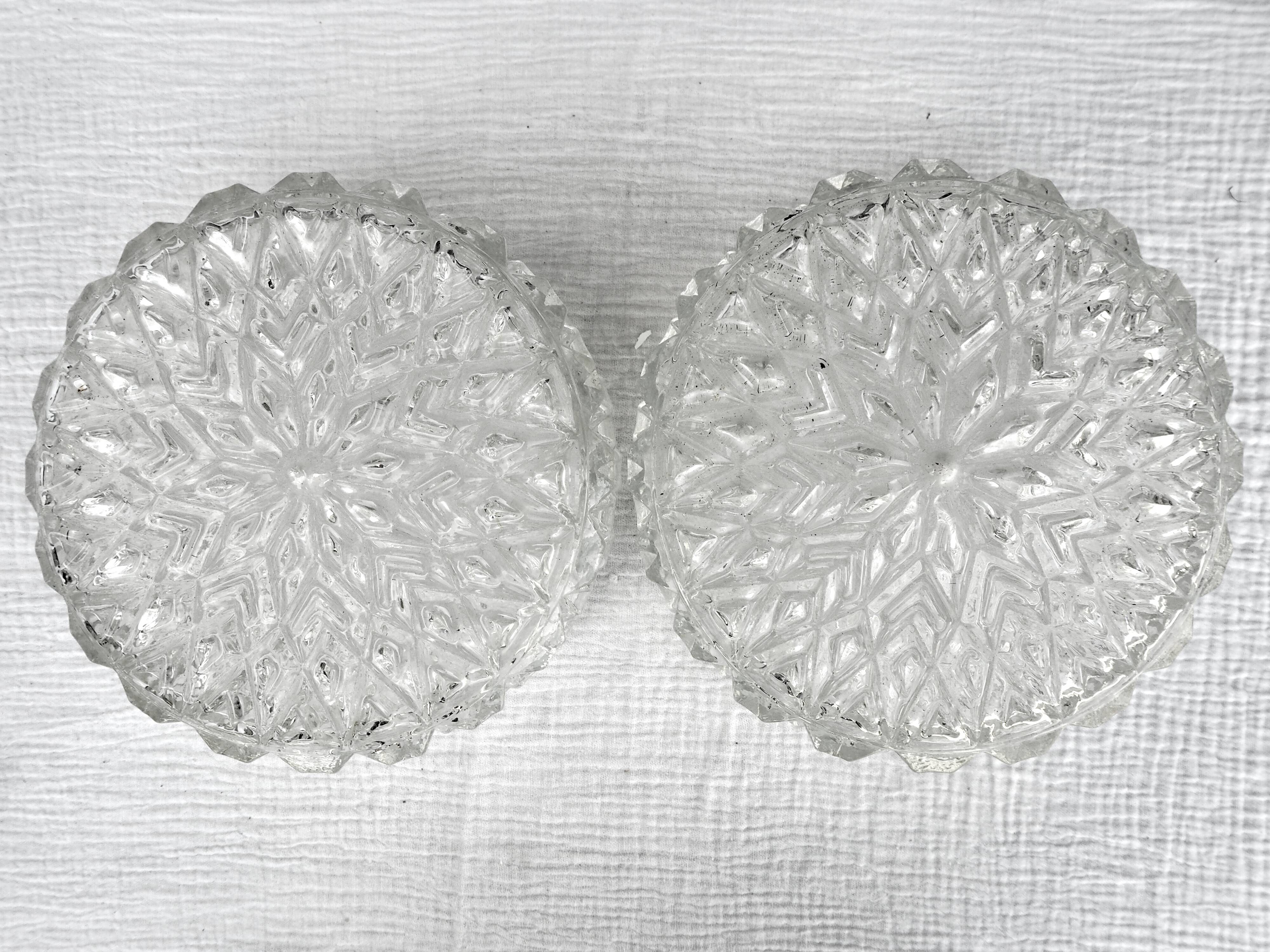 Pair of round ceiling lights in chiseled glass