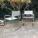 Pair of cantilever armchairs in grey leather made in italy