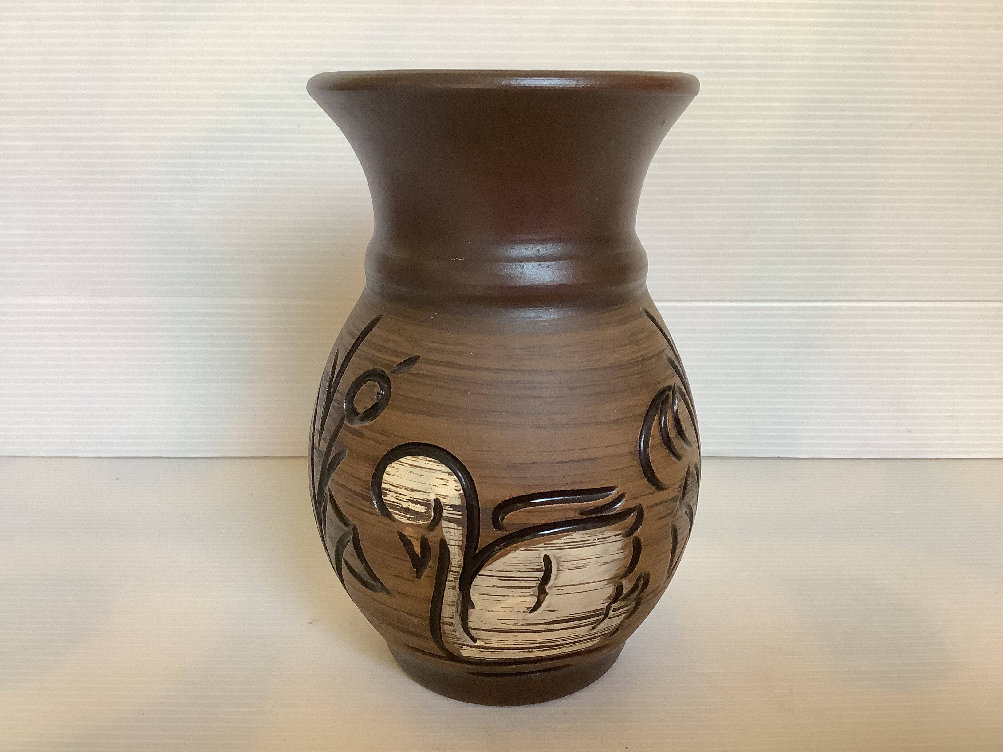 Zoomorphic vase with a swan