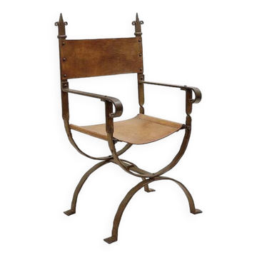 Curule armchair in wrought iron and leather