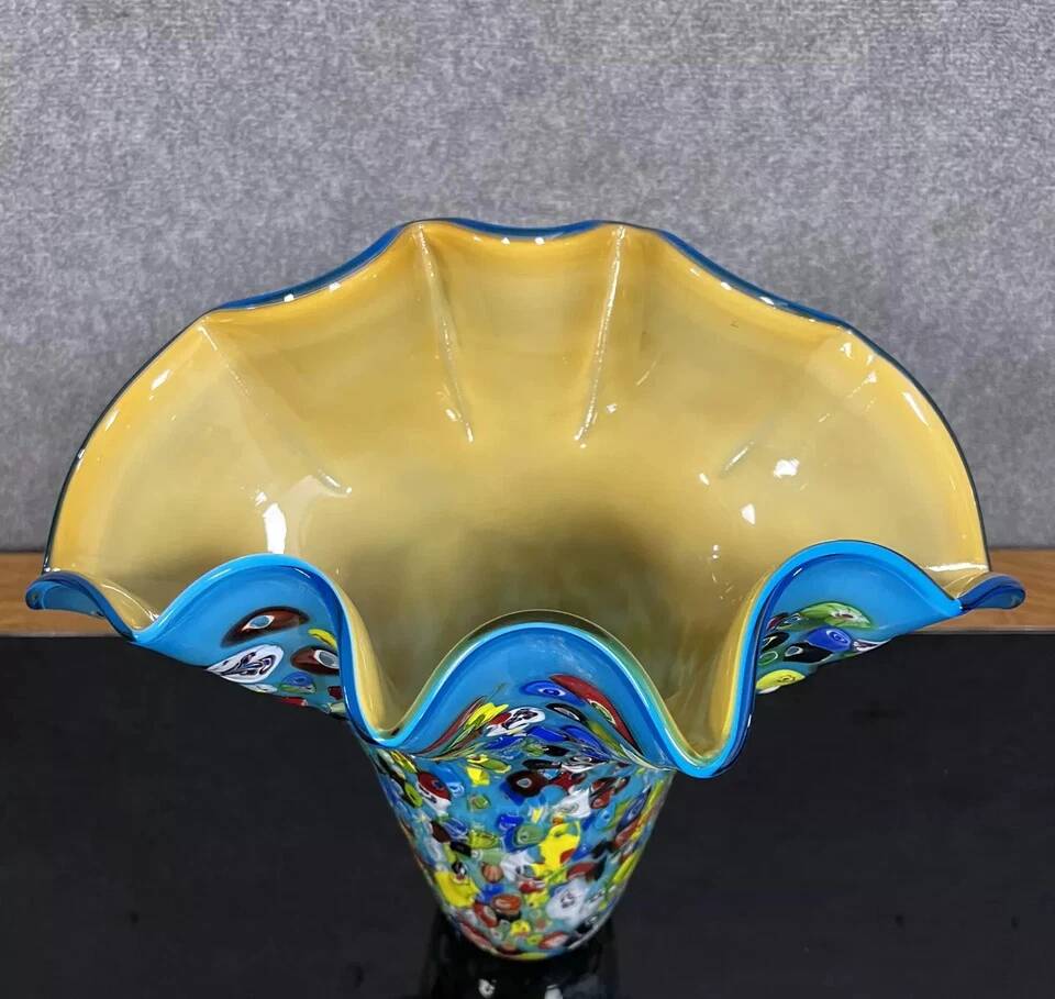 Venice circa 1980: Large "octopusy" vase in millefiori glass with a blue background