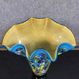 Venice circa 1980: Large "octopusy" vase in millefiori glass with a blue background