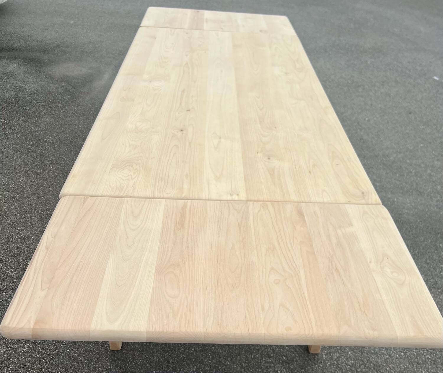 Large renovated table with 2 extensions and 2 drawers in raw solid wood.