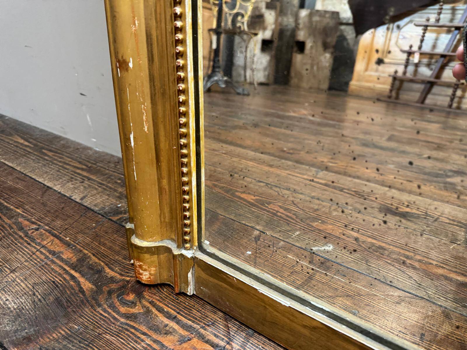 Antique gilded fireplace mirror