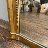 Old gilded fireplace mirror