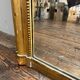 Antique gilded fireplace mirror