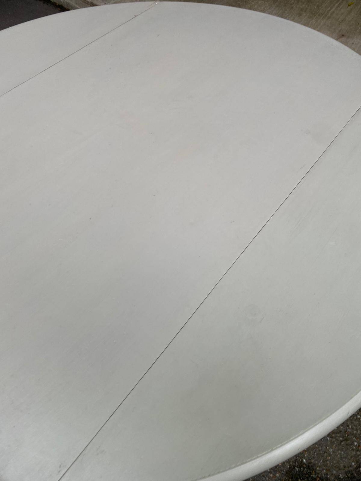 Louis Philippe round dining table with folding shutters repainted in beige grey