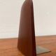 Mid-century Scandinavian bookends in teak and brass.