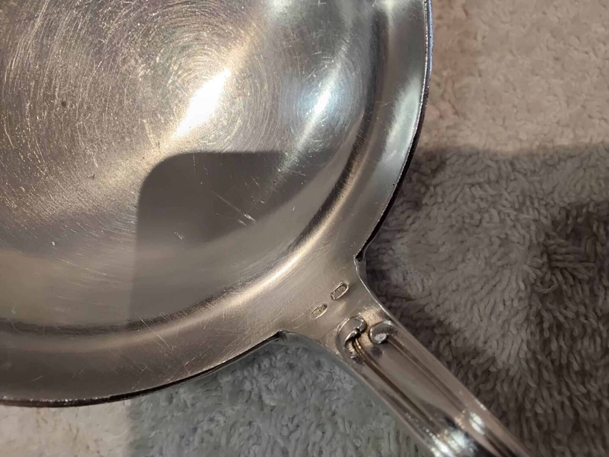 2 Silver-plated soup and sauce ladles with rocaille ribbon decoration