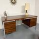 Vintage desk with rosewood veneer and chrome metal design from the 1970s.