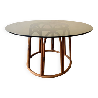 Vintage round rattan dining table with smoked glass top