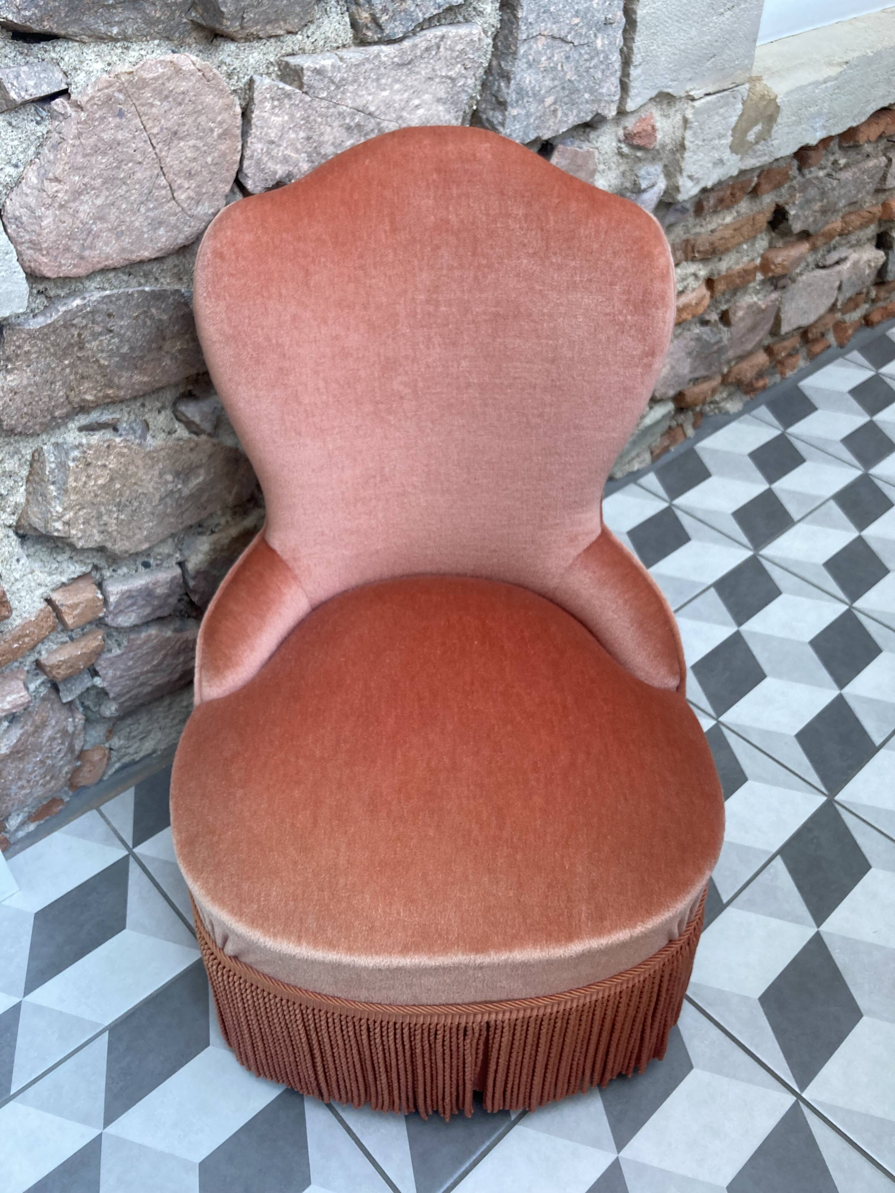 Fauteuil chauffeuse vintage velours saumon