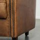 Aged sheepskin clubchair with beautiful vintage patina and comfortable seat