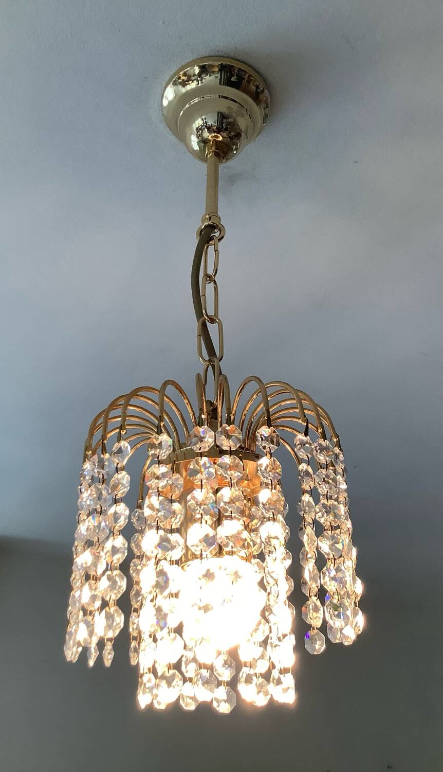 Small vintage brass chandelier with crystal droplets