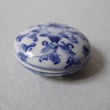 Porcelain pill box decorated with blue and white flowers