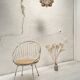 Basket armchair in metal and wood.
