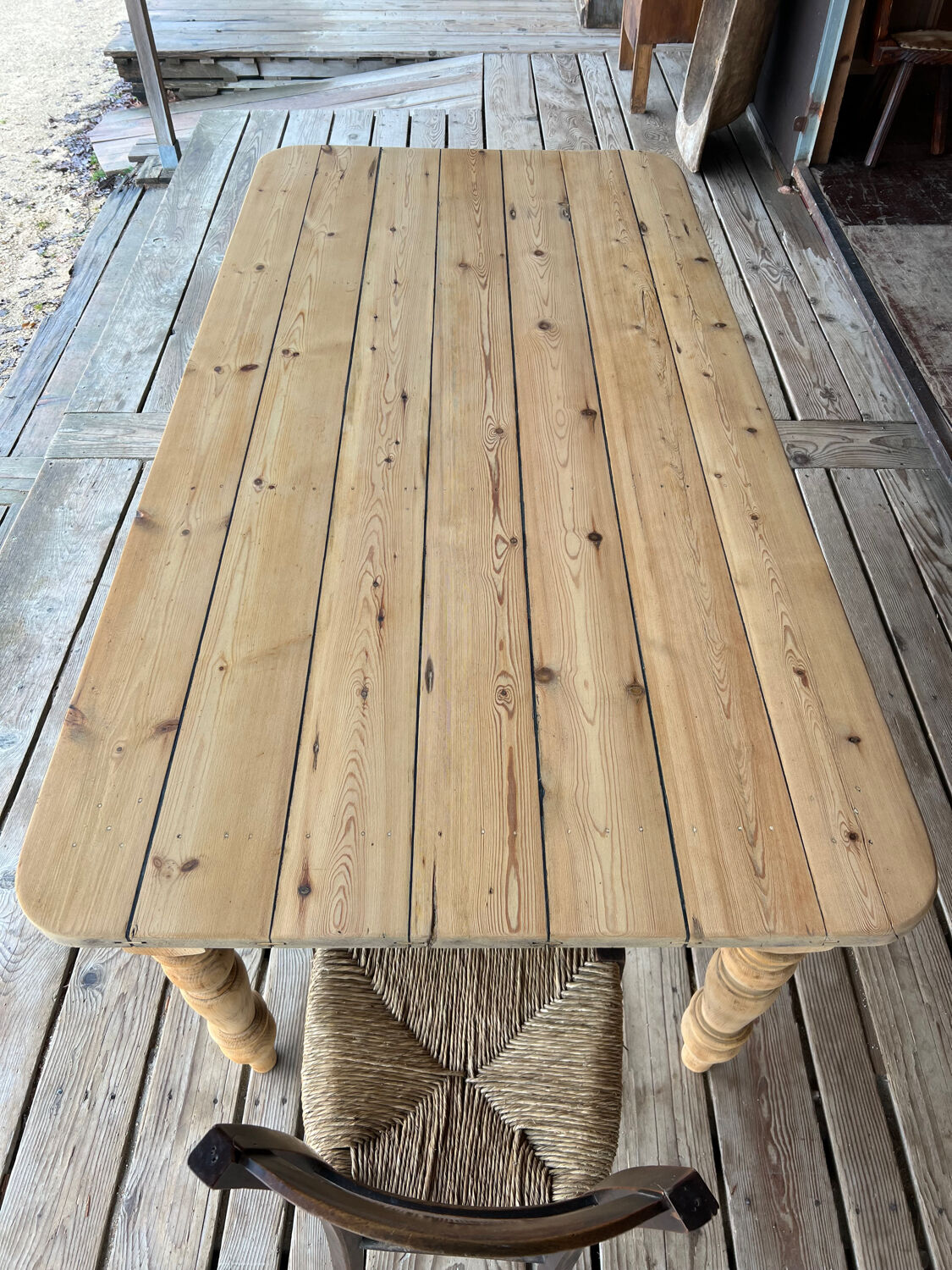 Old farmhouse table in raw wood
