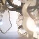 Lustre en bronze et pampilles bicolore