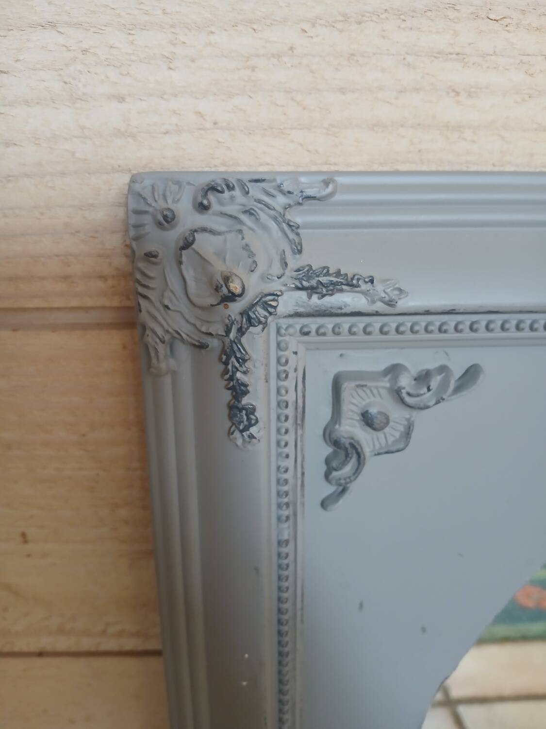 Mirror with a grey wooden frame