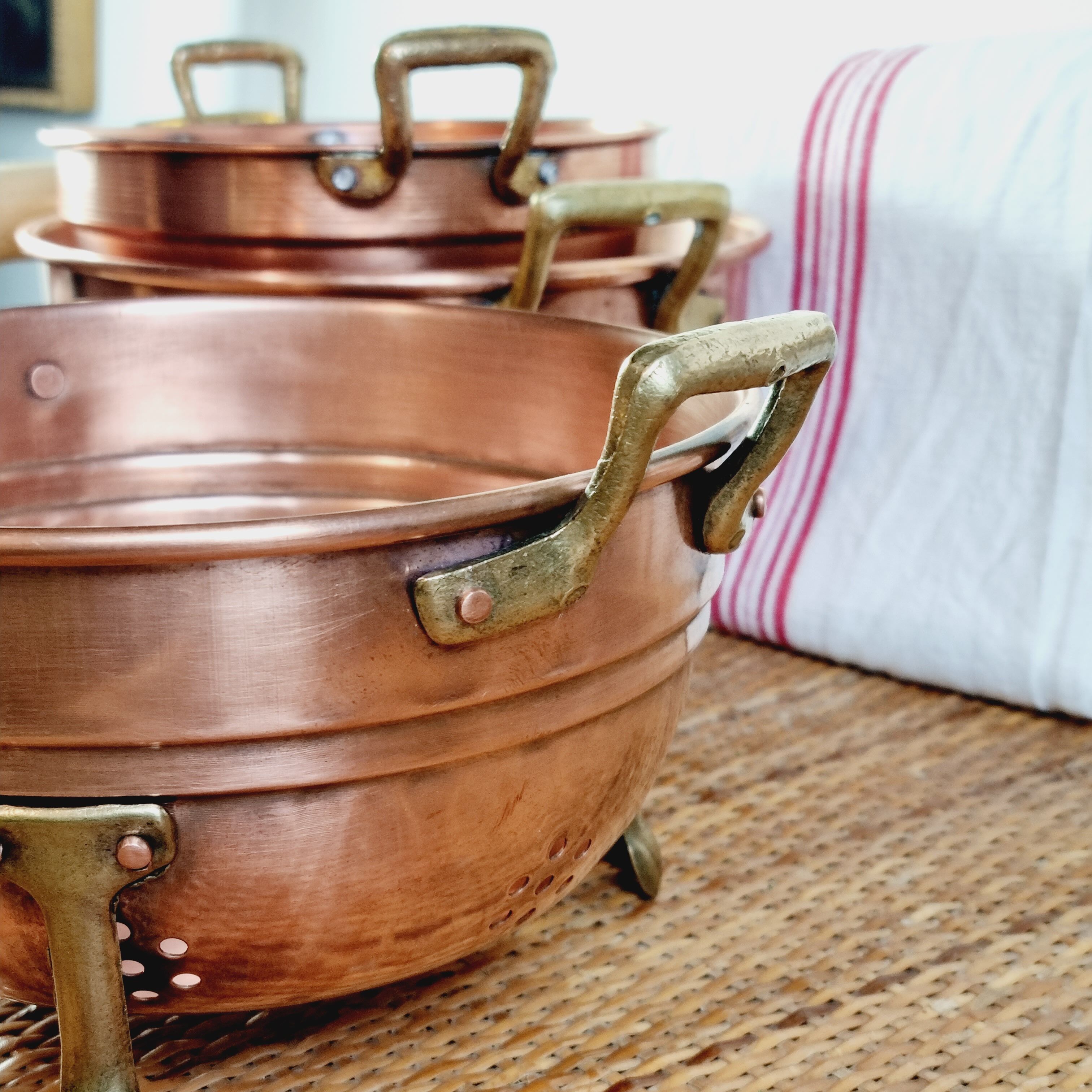 Copper and brass strainer lion's leg