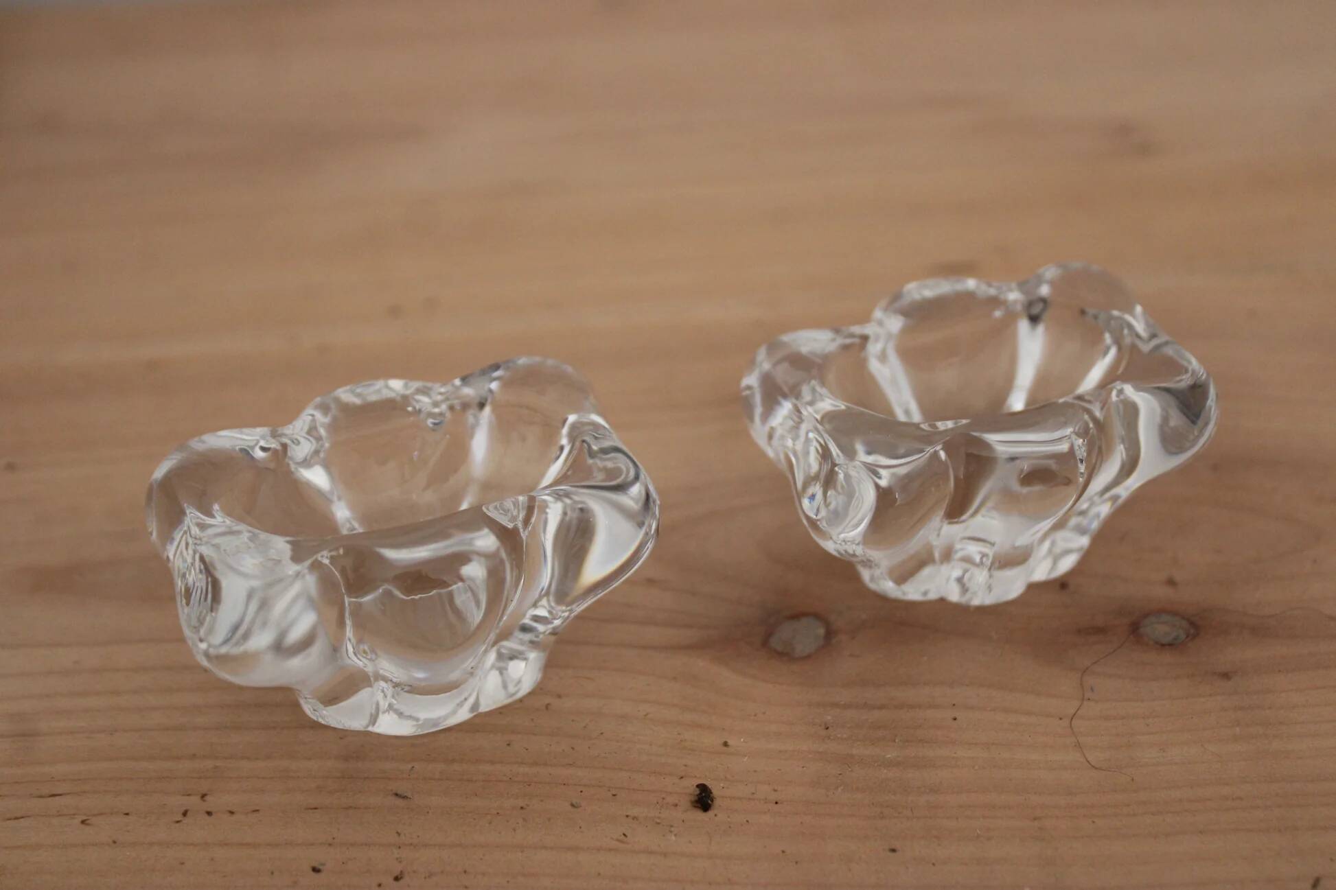 Pair of crystal salt cellars from Daum France with box and spoon.