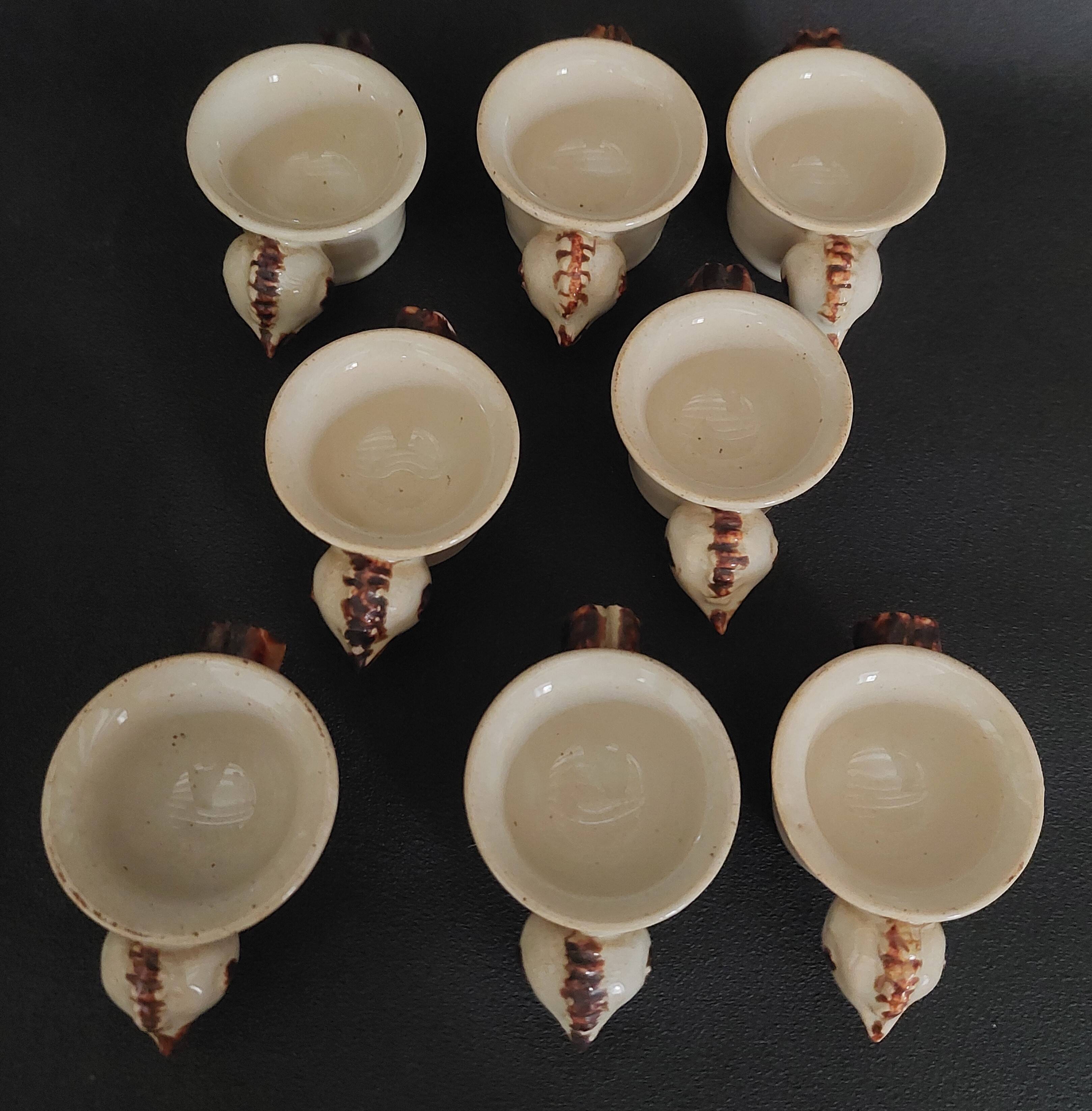 Egg cups with servant, series of eight stoneware signed arts ceram grand feu XX