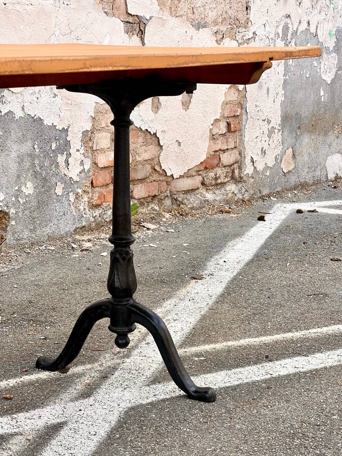 Antique bistro table with cast iron legs