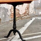 Antique bistro table with cast iron legs