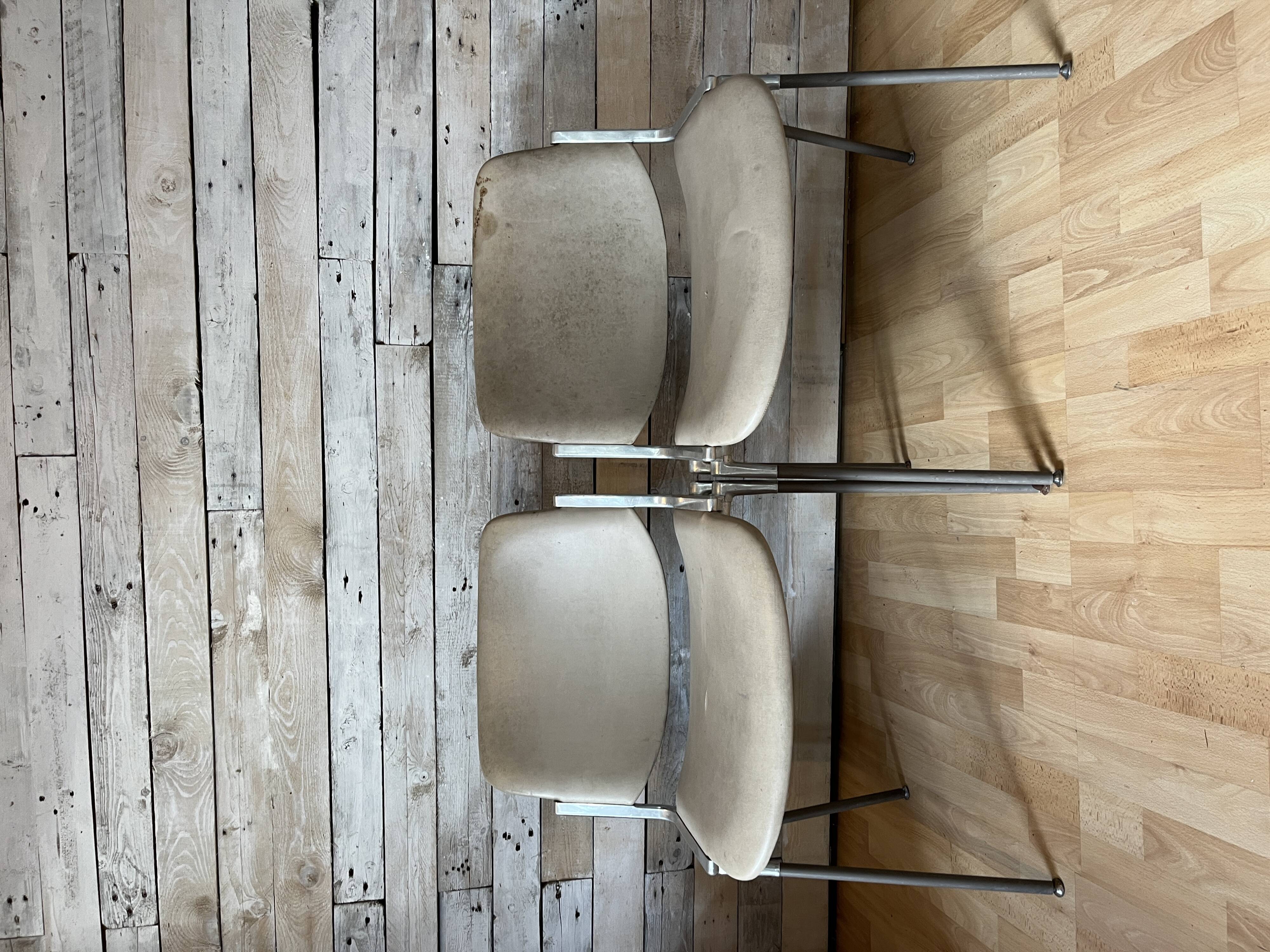 Pair of stackable chairs by Giancarlo Piretti for Castelli