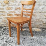 12 varnished bistro chairs