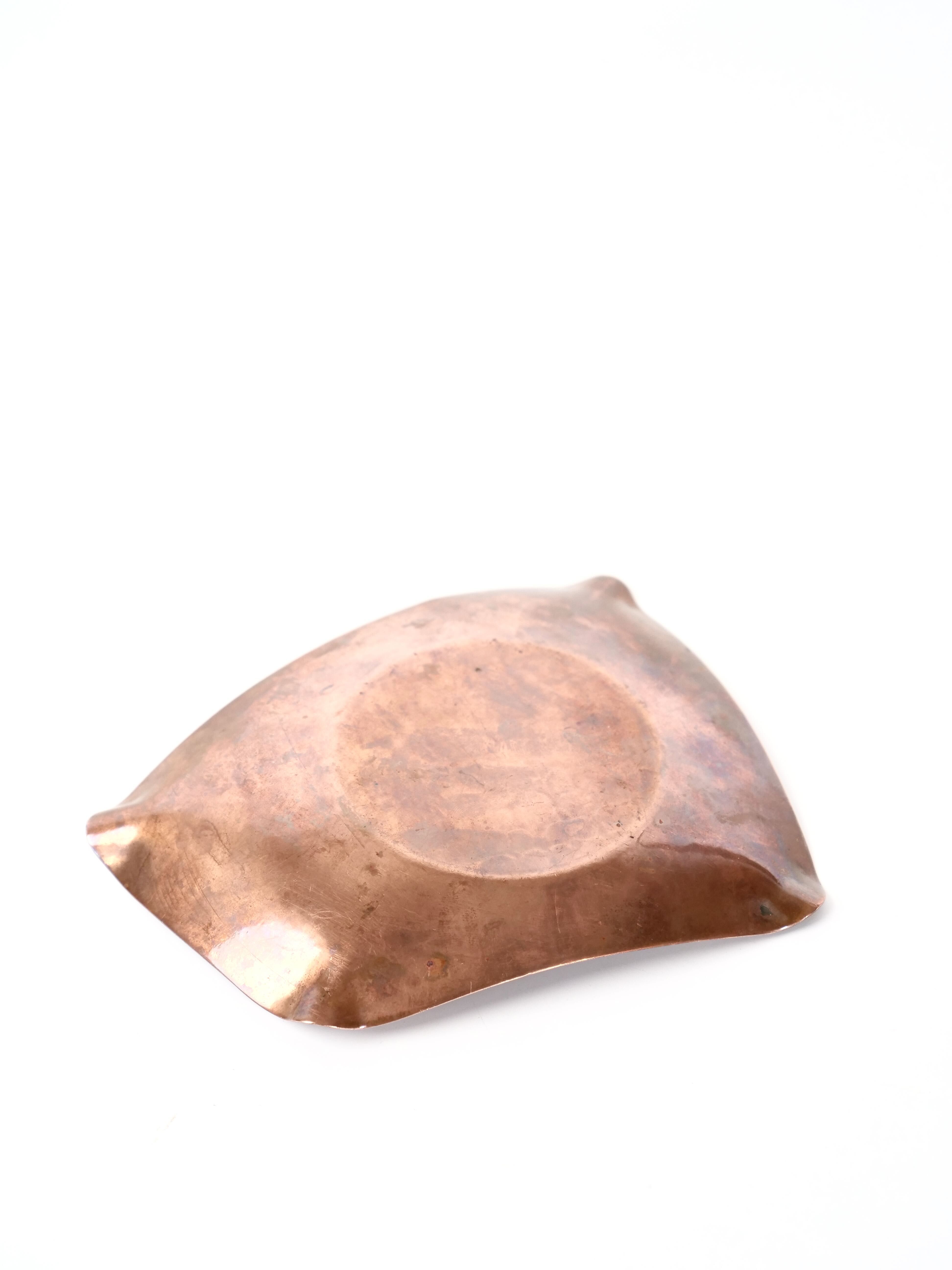 Free-form copper ashtray