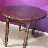 Old oval table with 2 swings