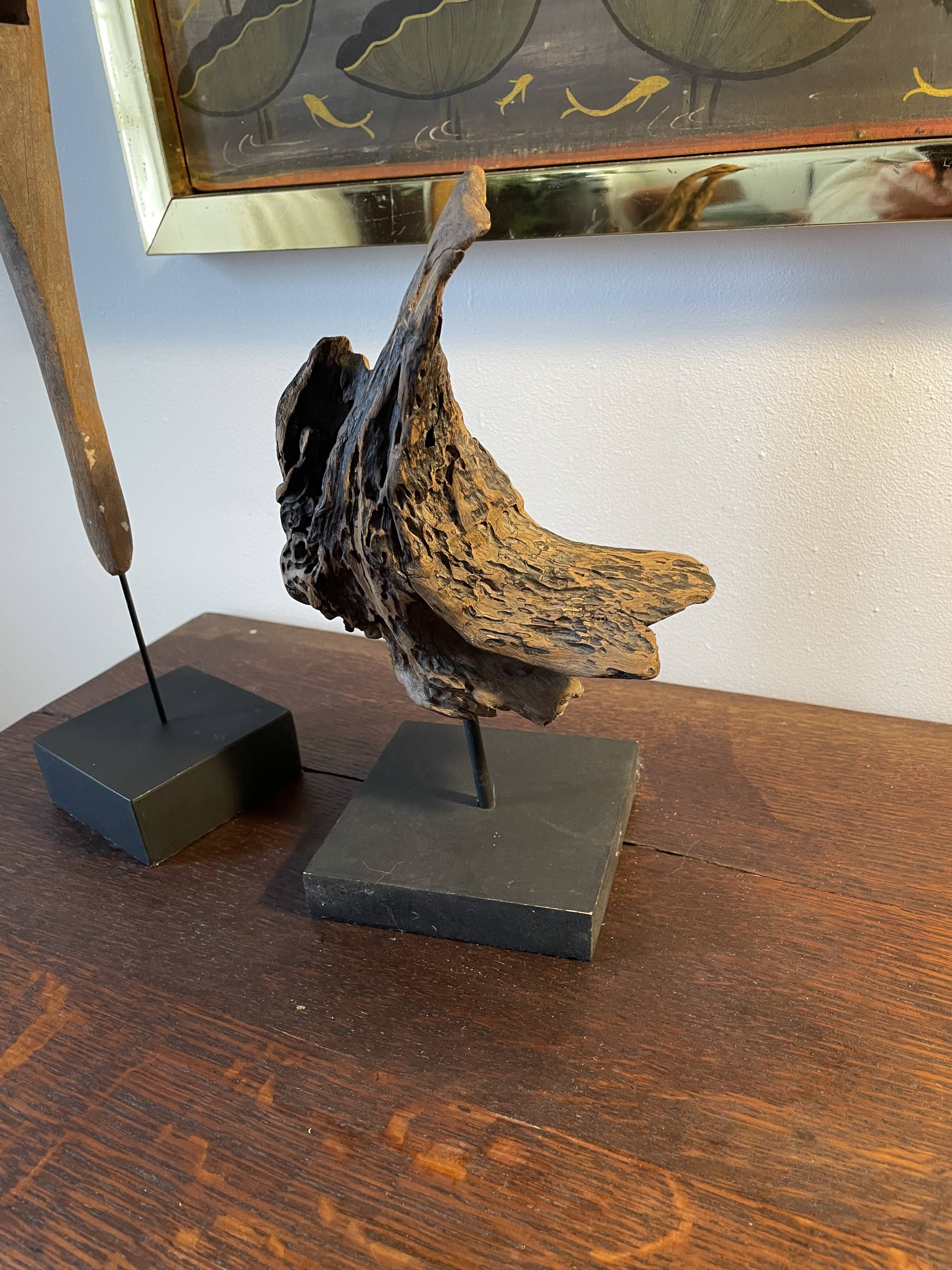 Set of 2 wooden sculptures on base