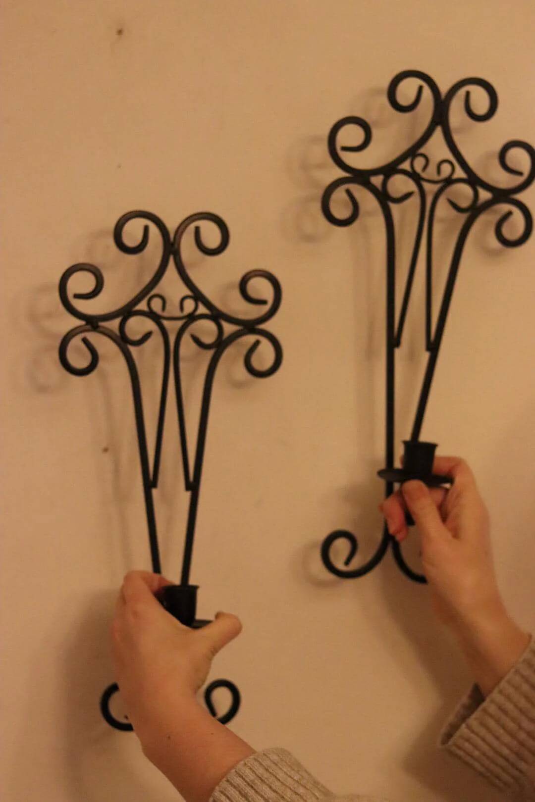 Pair of vintage black metal sconces