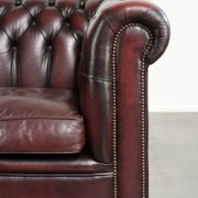 English cowhide Chesterfield club armchair in a beautiful red colour
