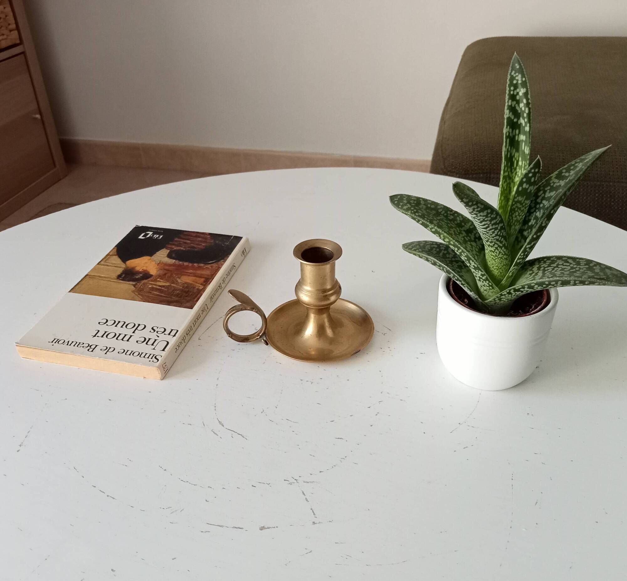 Antique hand candlestick in solid gilded brass.
